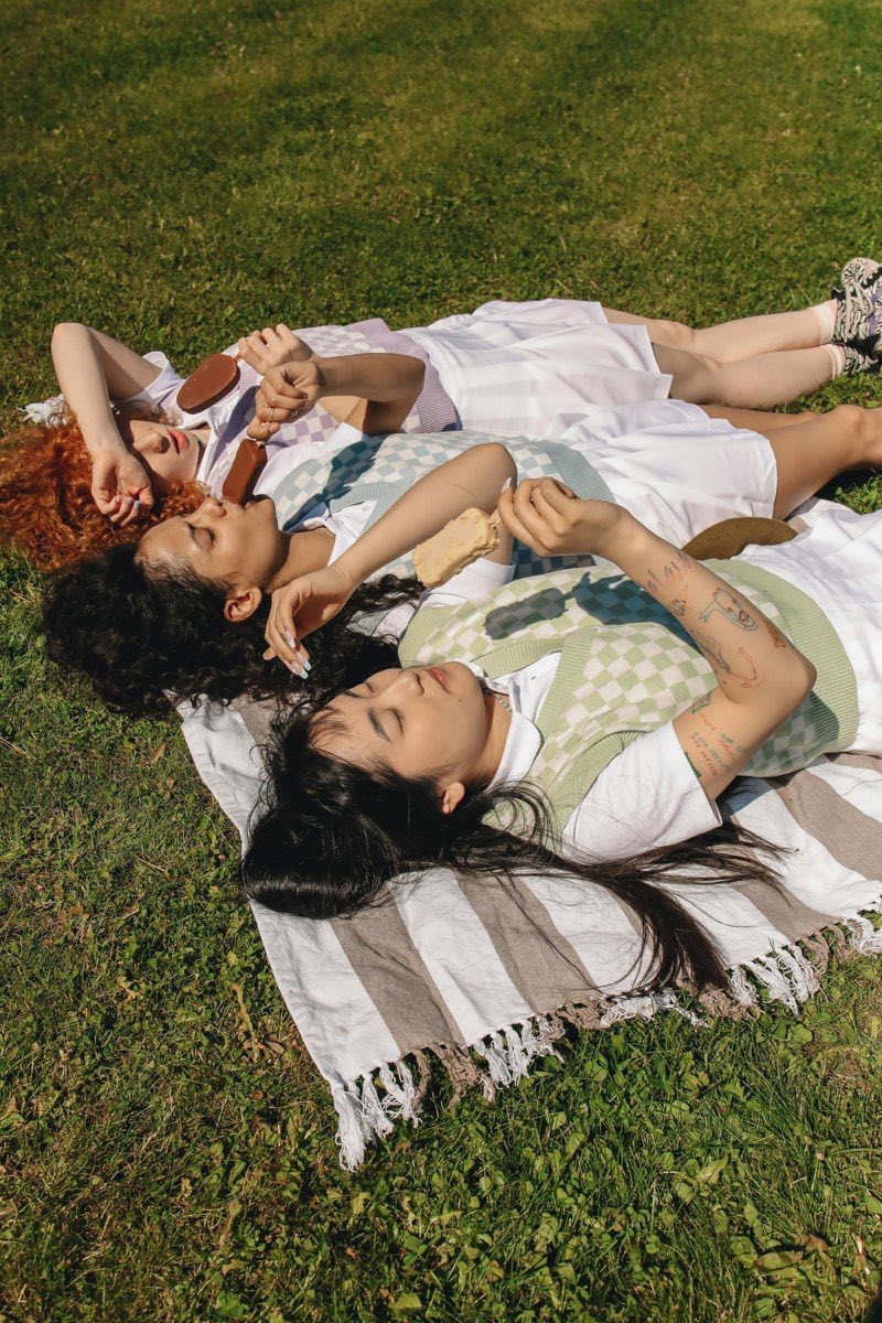 Friends hanging out in the sun and making friends in Los Angeles.